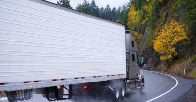 a truck drives on a road before an accident | Fuller and Fuller, Attorneys PLLC