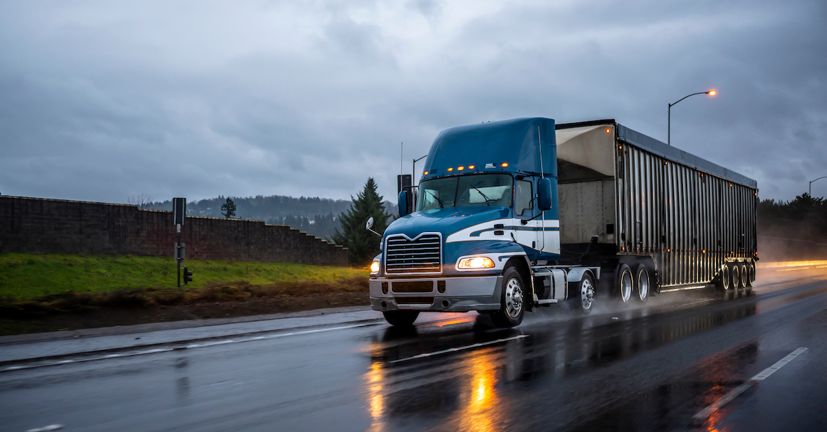a truck drives on a wet road | Fuller and Fuller, Attorneys, PLLC